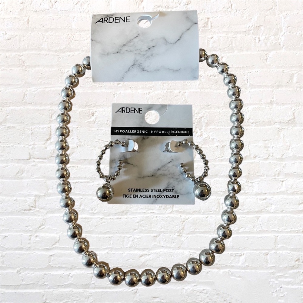 Ardene Silver-toned bead necklace and earrings set.
NWT